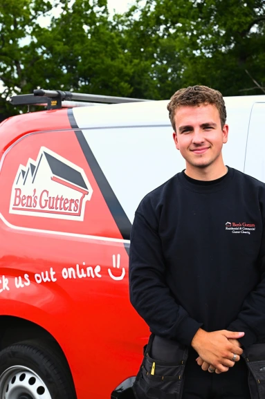 Our local gutter cleaner in Cambridge standing beside company vehicle