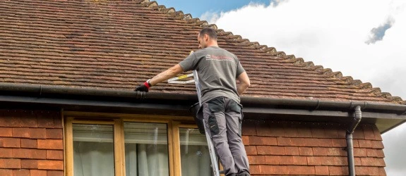 Gutter cleaning a residential property in Cambridge