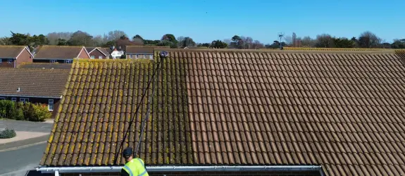 Roof cleaning a healthcare centre in Cambridge